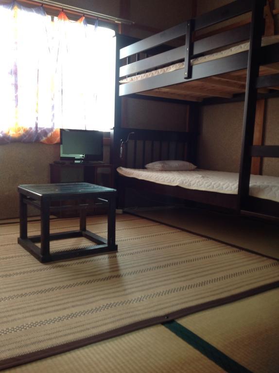 Buddha Guest House Shirahama Onsen Chambre photo